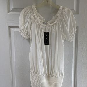 Cream blouse New Size Large with shirring at bottom.